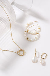 Oval Huggie Hoops With Pearl Drop Earrings Earrings eklexic 